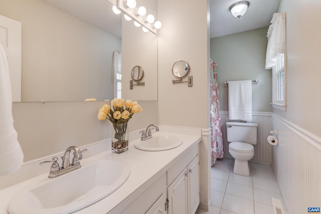 4045 Buck Island Rd, Charlottesville, VA 22902 - full bathroom featuring tile patterned flooring, wainscoting, toilet, and a sink