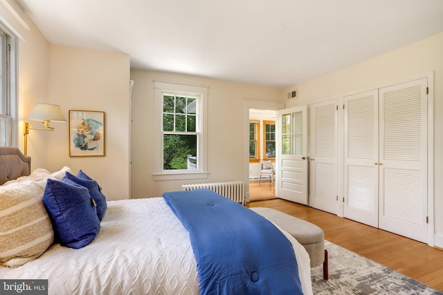 6218 30th St NW, Washington, DC 20015 - bedroom with radiator and wood finished floors