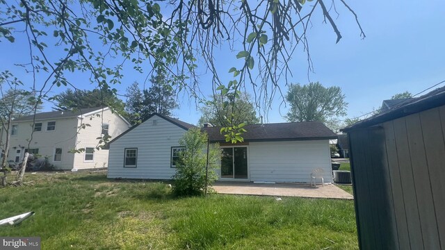 151 Pageant Ln, Willingboro, NJ 08046 - rear view of property featuring a patio, a yard, and cooling unit