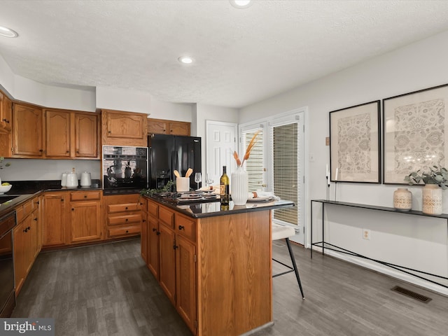 2828 Quarry Heights Way, Baltimore, MD 21209 - kitchen featuring black appliances, dark wood finished floors, brown cabinetry, dark countertops, and recessed lighting