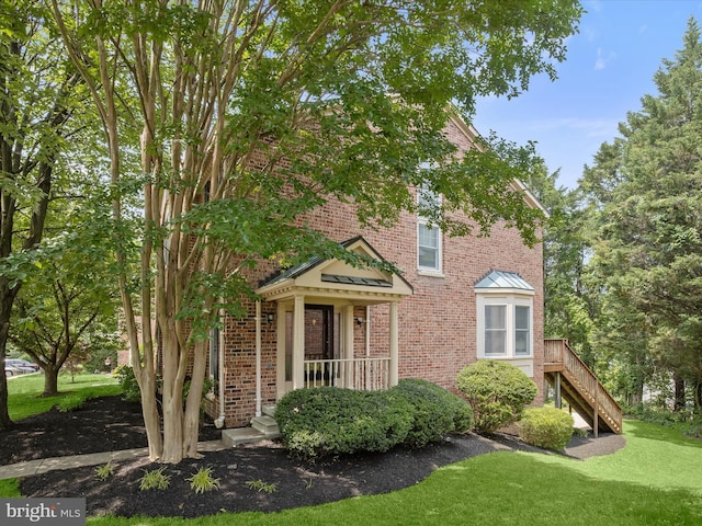 2828 Quarry Heights Way, Baltimore, MD 21209 - view of front of home featuring brick siding and a front yard