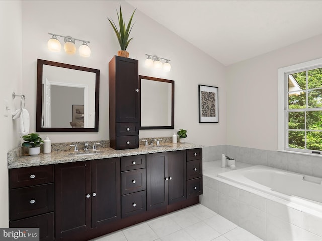 2828 Quarry Heights Way, Baltimore, MD 21209 - bathroom featuring vaulted ceiling, double vanity, a garden tub, and tile patterned flooring