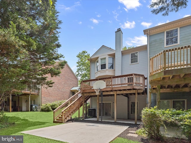 2828 Quarry Heights Way, Baltimore, MD 21209 - rear view of property featuring a patio area, a lawn, a deck, stairway, and central air condition unit