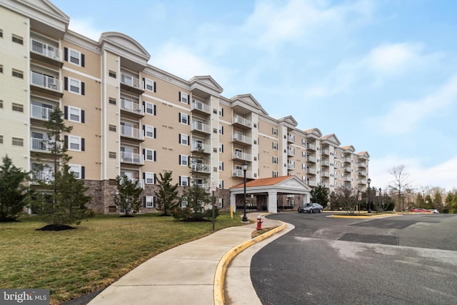 6301 Edsall Rd Unit 303, Alexandria, VA 22312 - view of building exterior with uncovered parking
