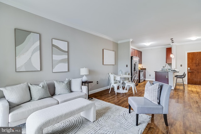 6301 Edsall Rd Unit 303, Alexandria, VA 22312 - living area featuring baseboards, wood finished floors, and crown molding