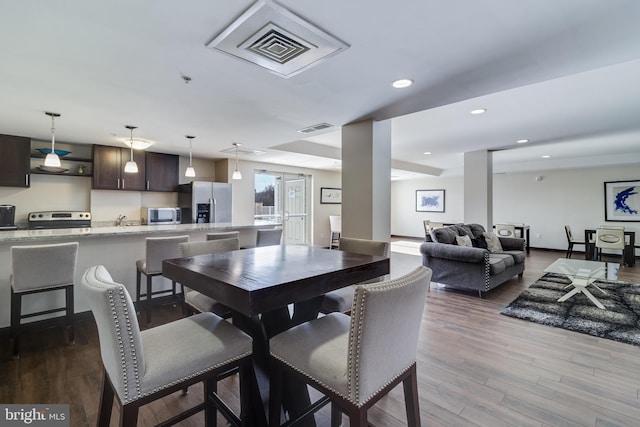 6301 Edsall Rd Unit 303, Alexandria, VA 22312 - dining room with wood finished floors, visible vents, and recessed lighting