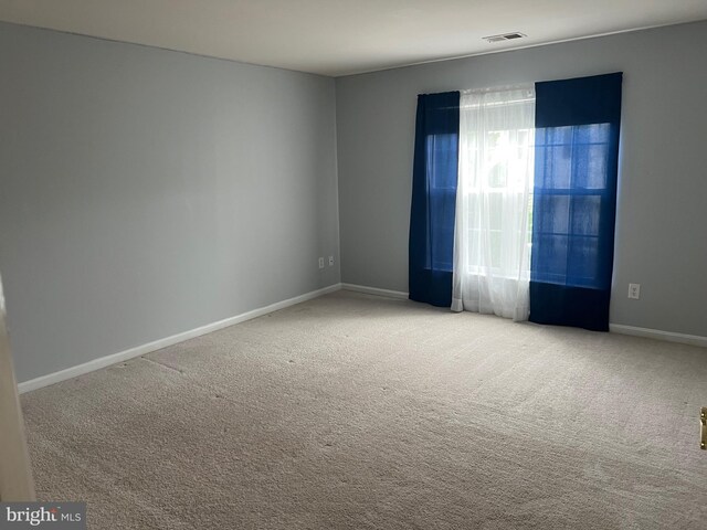 16258 John Rowland Trl, Milton, DE 19968 - spare room with carpet flooring and baseboards