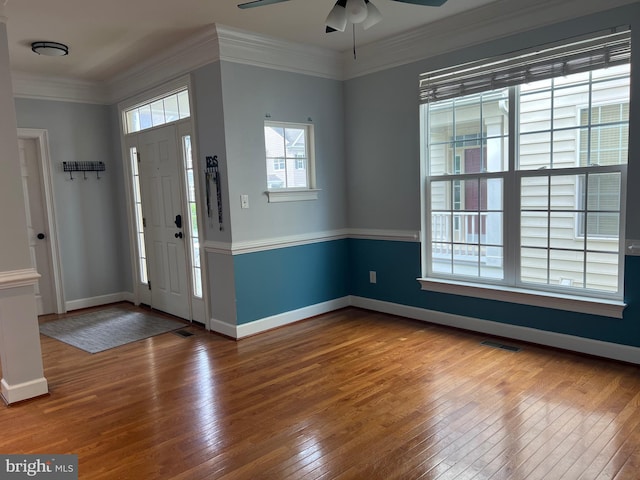 16258 John Rowland Trl, Milton, DE 19968 - entryway with a ceiling fan, hardwood / wood-style flooring, crown molding, and baseboards