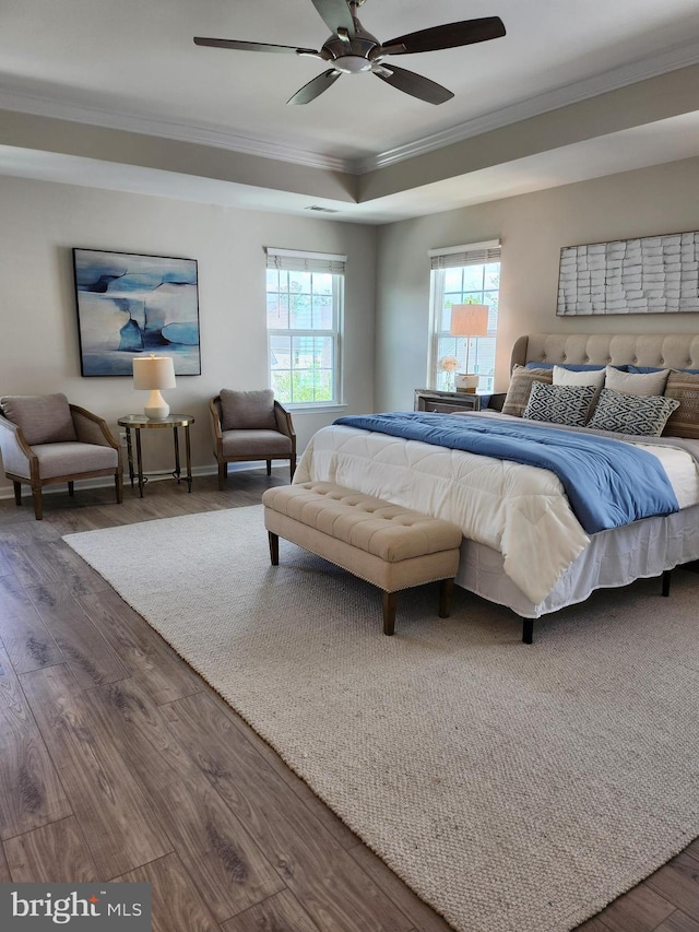 4480 Weejun Loop, Woodbridge, VA 22192 - bedroom with ornamental molding, wood finished floors, a ceiling fan, and a raised ceiling