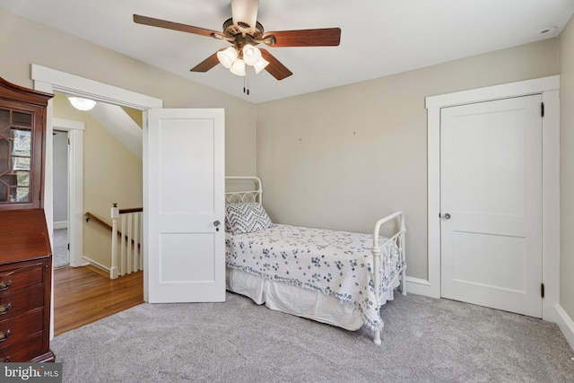 bedroom featuring baseboards, carpet flooring, and ceiling fan