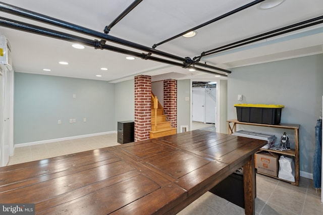 interior space with baseboards and recessed lighting
