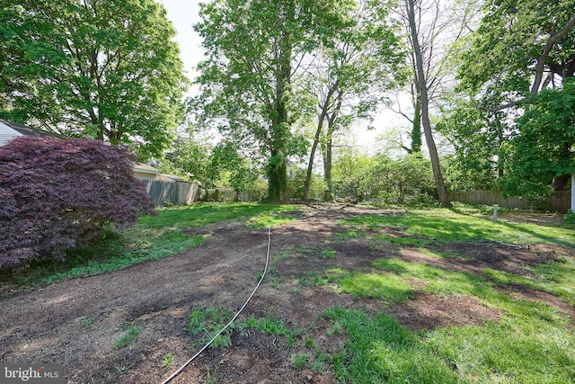 view of yard featuring fence