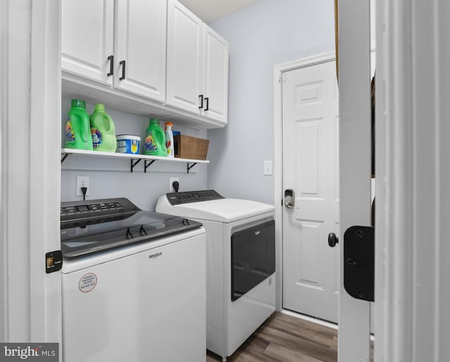 362 Hoffeckers Mill Dr, Smyrna, DE 19977 - laundry area with washer and dryer, cabinet space, and wood finished floors