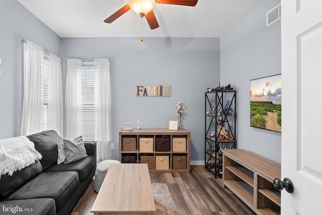 362 Hoffeckers Mill Dr, Smyrna, DE 19977 - living area featuring wood finished floors, ceiling fan, and baseboards