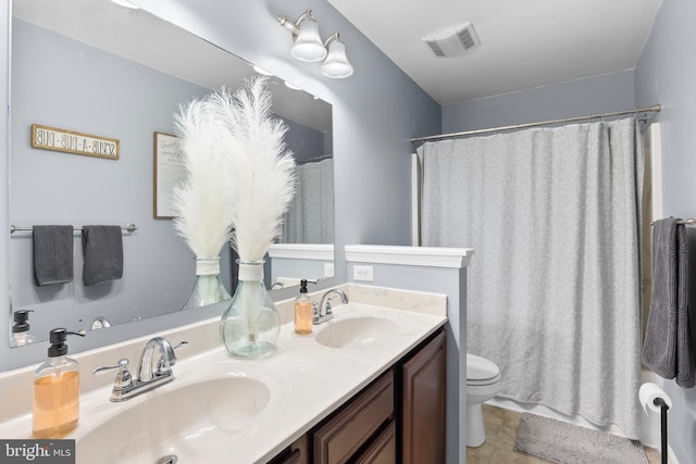 362 Hoffeckers Mill Dr, Smyrna, DE 19977 - full bathroom with toilet, double vanity, and a shower with shower curtain