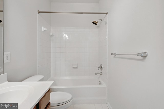 bathroom featuring vanity, tile patterned flooring, shower / bathtub combination, and toilet