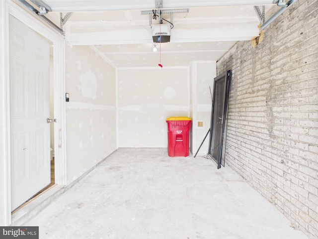 garage featuring a garage door opener
