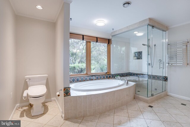 8604 Tobin Rd, Annandale, VA 22003 - full bath with a garden tub, radiator, toilet, ornamental molding, and a shower stall