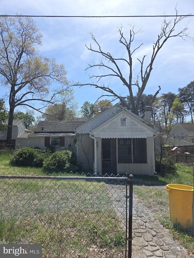 bungalow-style house featuring board and batten siding