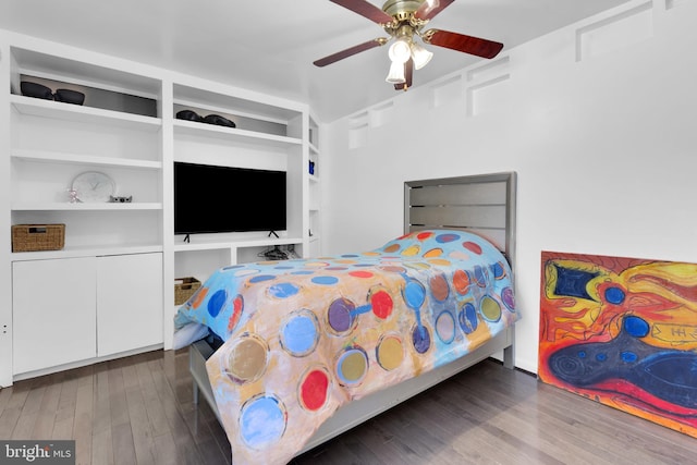 bedroom featuring ceiling fan and wood finished floors