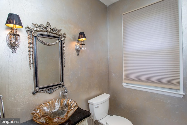 bathroom featuring toilet