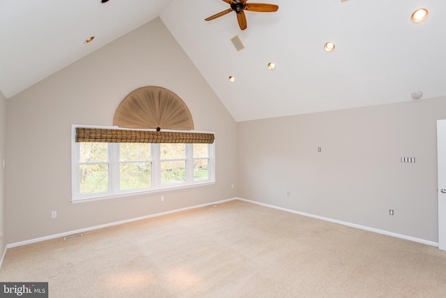 unfurnished room with baseboards, a ceiling fan, and light colored carpet
