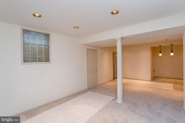 finished basement featuring recessed lighting and light colored carpet