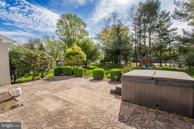 view of patio featuring a hot tub