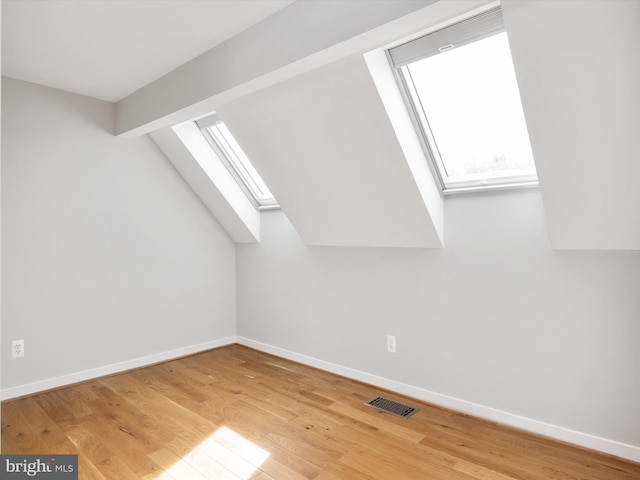 504 Moorings Cir, Arnold, MD 21012 - bonus room featuring baseboards, visible vents, a skylight, and wood finished floors