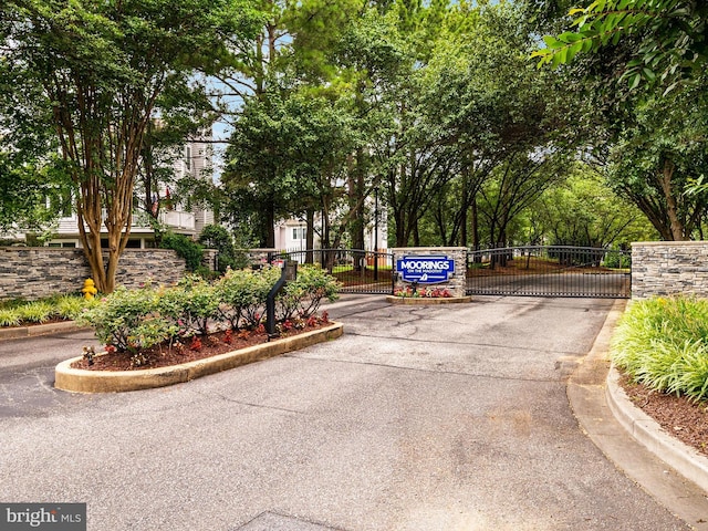 504 Moorings Cir, Arnold, MD 21012 - view of street with a gate, curbs, and a gated entry