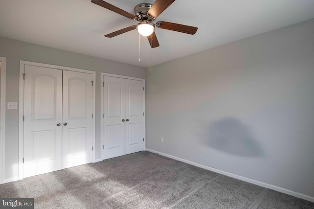 112 Ryder Benson Ln, Front Royal, VA 22630 - unfurnished bedroom featuring carpet floors, multiple closets, a ceiling fan, and baseboards