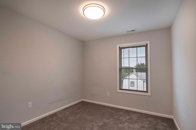 112 Ryder Benson Ln, Front Royal, VA 22630 - empty room with dark colored carpet, visible vents, and baseboards