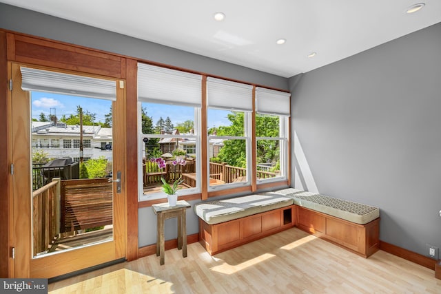 sunroom / solarium featuring plenty of natural light