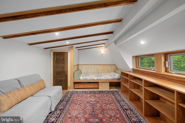 living room with vaulted ceiling with beams, recessed lighting, and wood finished floors