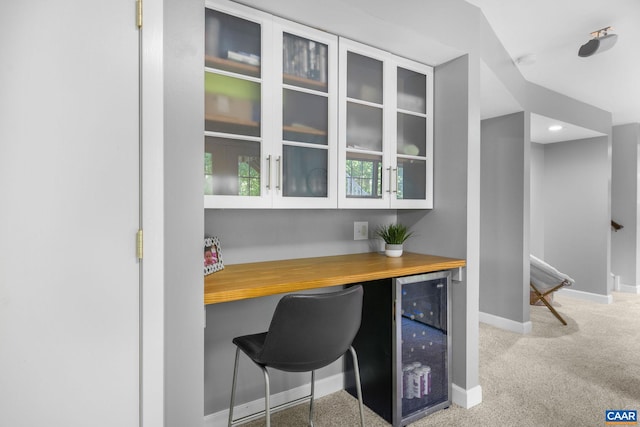 bar featuring baseboards, recessed lighting, carpet, and wine cooler