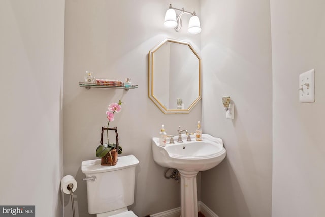 bathroom featuring toilet