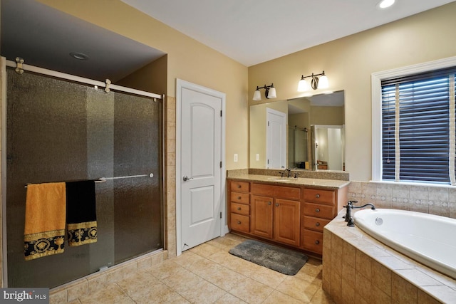 bathroom featuring a stall shower, a bath, vanity, tile patterned flooring, and recessed lighting