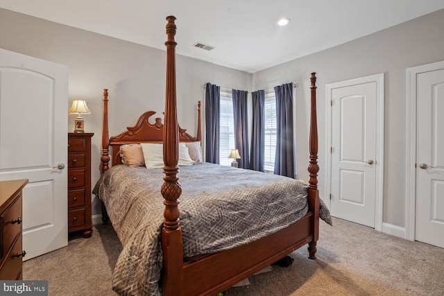 carpeted bedroom with recessed lighting and baseboards