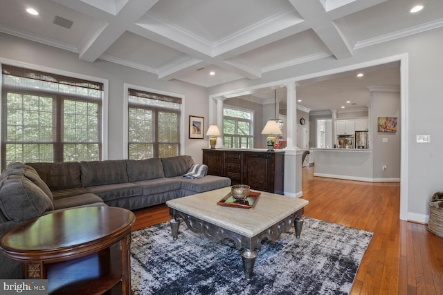 living area with coffered ceiling, decorative columns, light wood-style flooring, beam ceiling, and baseboards