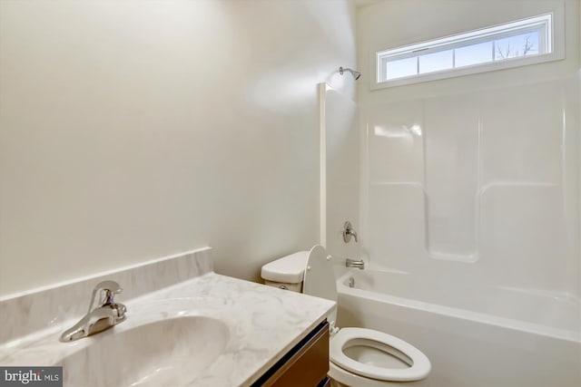 full bath with toilet, bathing tub / shower combination, and vanity