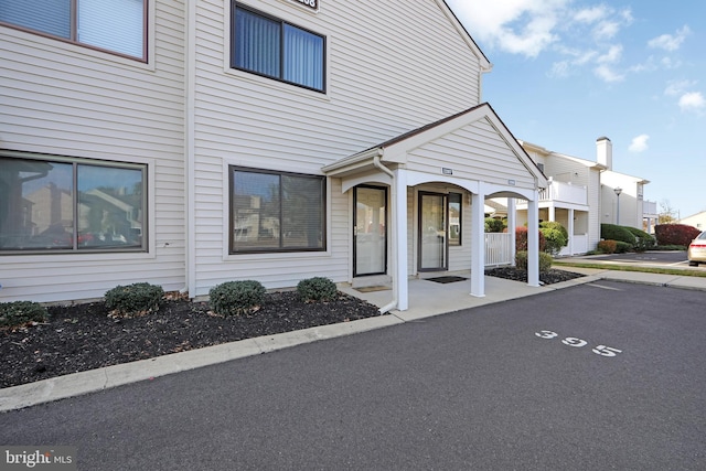 exterior space with uncovered parking