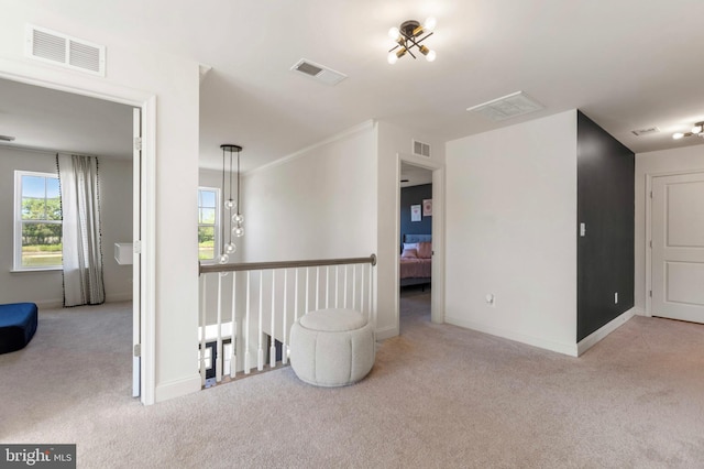 unfurnished room featuring carpet flooring and visible vents