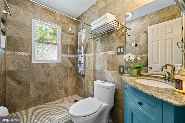 1826 Hylton Ave, Woodbridge, VA 22191 - bathroom with tile walls, a tile shower, toilet, and vanity