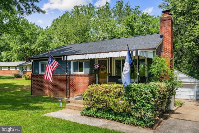 1826 Hylton Ave, Woodbridge, VA 22191 - bungalow-style house with a front lawn, roof with shingles, a chimney, and brick siding