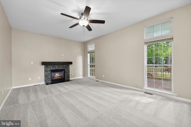 7883 Leroux Ln, Manassas, VA 20112 - unfurnished living room with a tile fireplace, baseboards, a ceiling fan, and carpet floors