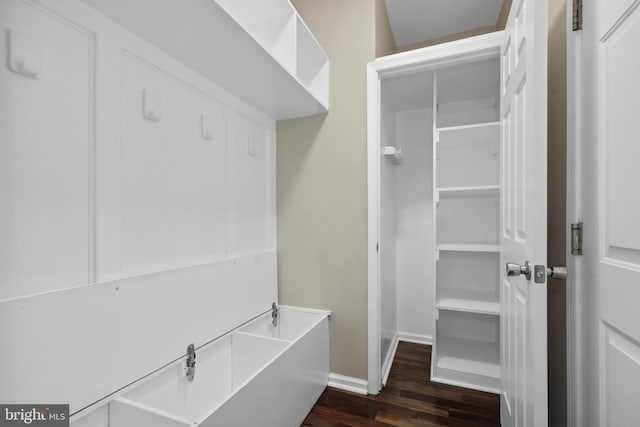 7883 Leroux Ln, Manassas, VA 20112 - mudroom with dark wood-type flooring and baseboards
