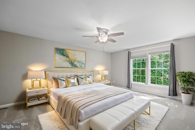 7883 Leroux Ln, Manassas, VA 20112 - carpeted bedroom featuring baseboards and a ceiling fan