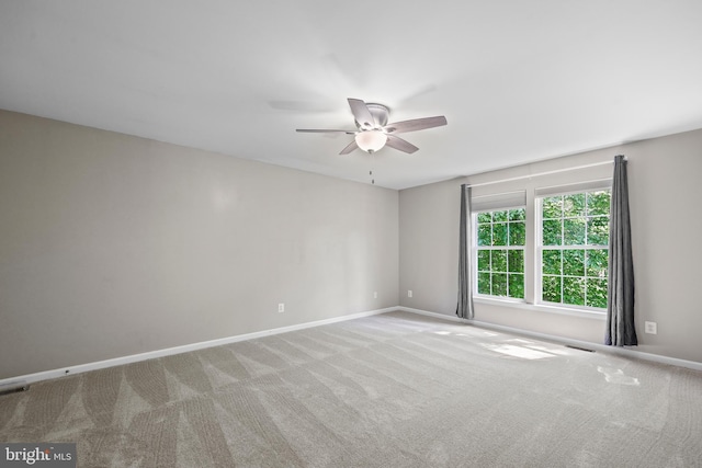7883 Leroux Ln, Manassas, VA 20112 - carpeted spare room with ceiling fan and baseboards