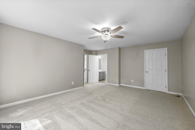 7883 Leroux Ln, Manassas, VA 20112 - unfurnished bedroom featuring carpet, baseboards, and ensuite bath