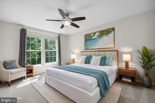 7883 Leroux Ln, Manassas, VA 20112 - bedroom with carpet floors, baseboards, and ceiling fan